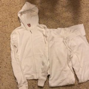White juicy couture track suit.